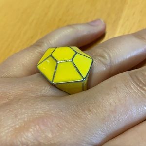 Yellow geometric ring